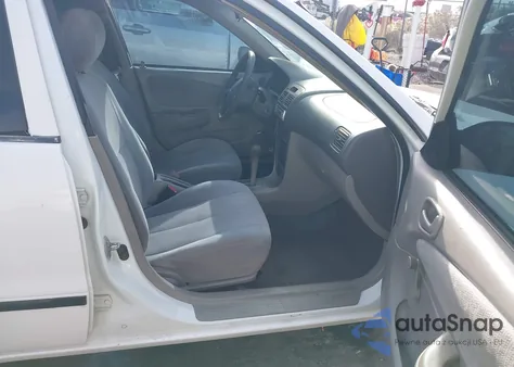 2002 Toyota Corolla Ce z USA, uszkodzony, nr VIN 1NXBR12E52Z566062